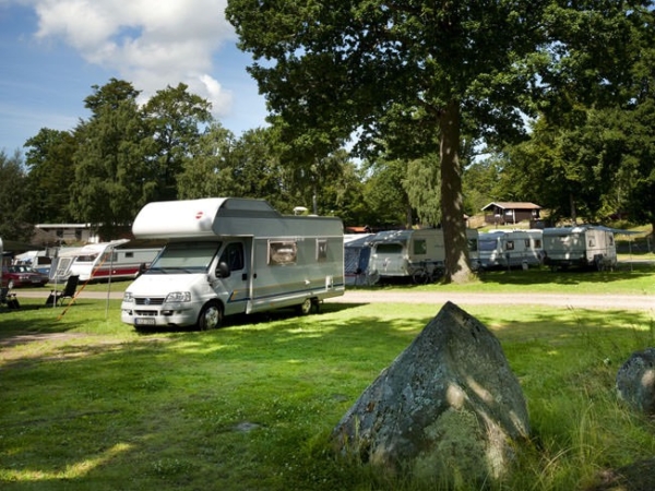 Motorhome parked at a camping spot